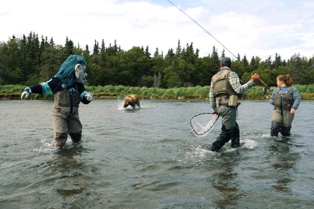 Seattle NHL team mascot has a close encounter with a brown bear during video shoot in Alaska