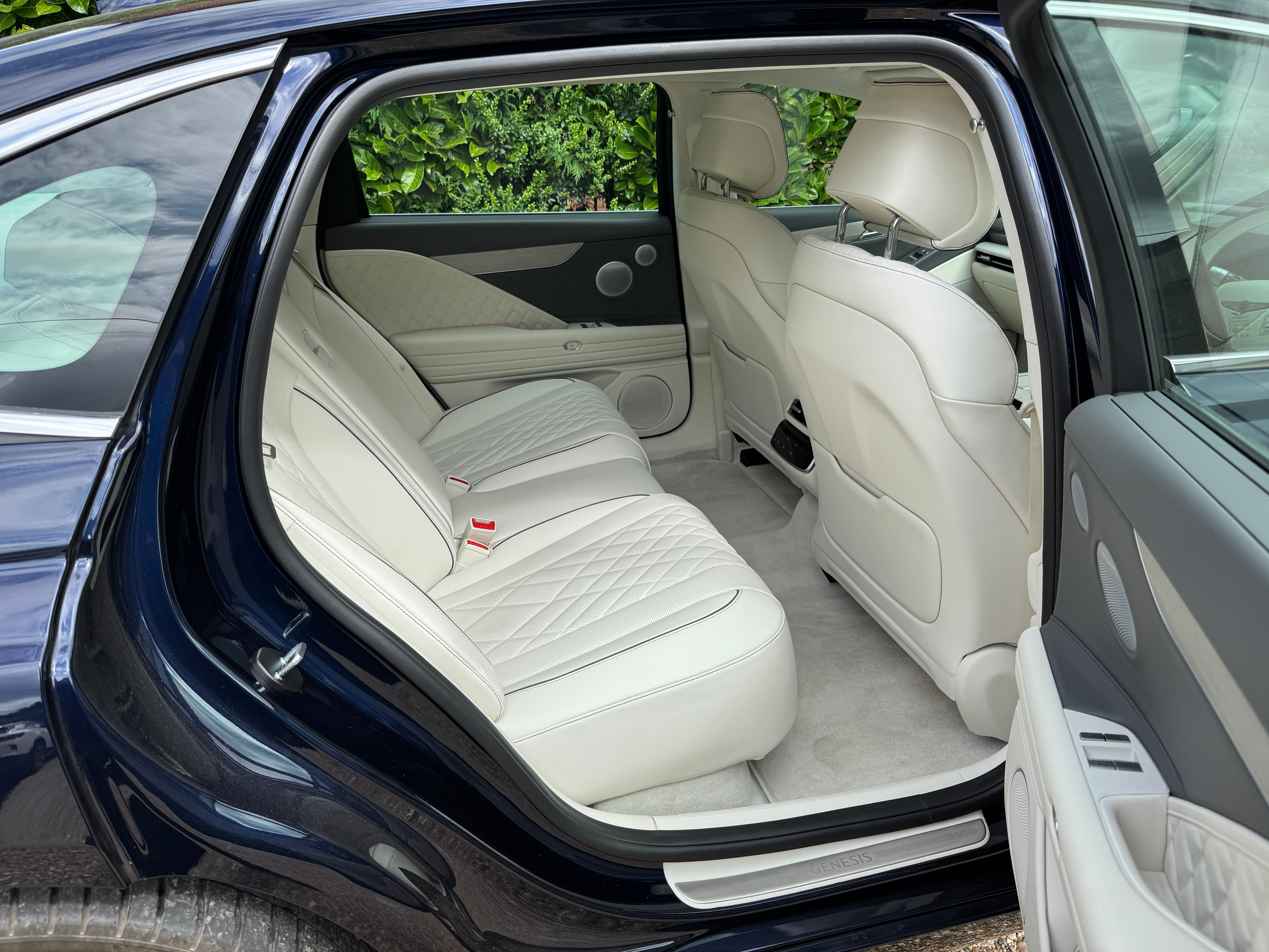 The extended wheelbase of the new Genesis Electrified G80 means more space than ever in the luxurious back seats. There are now powered doors, too