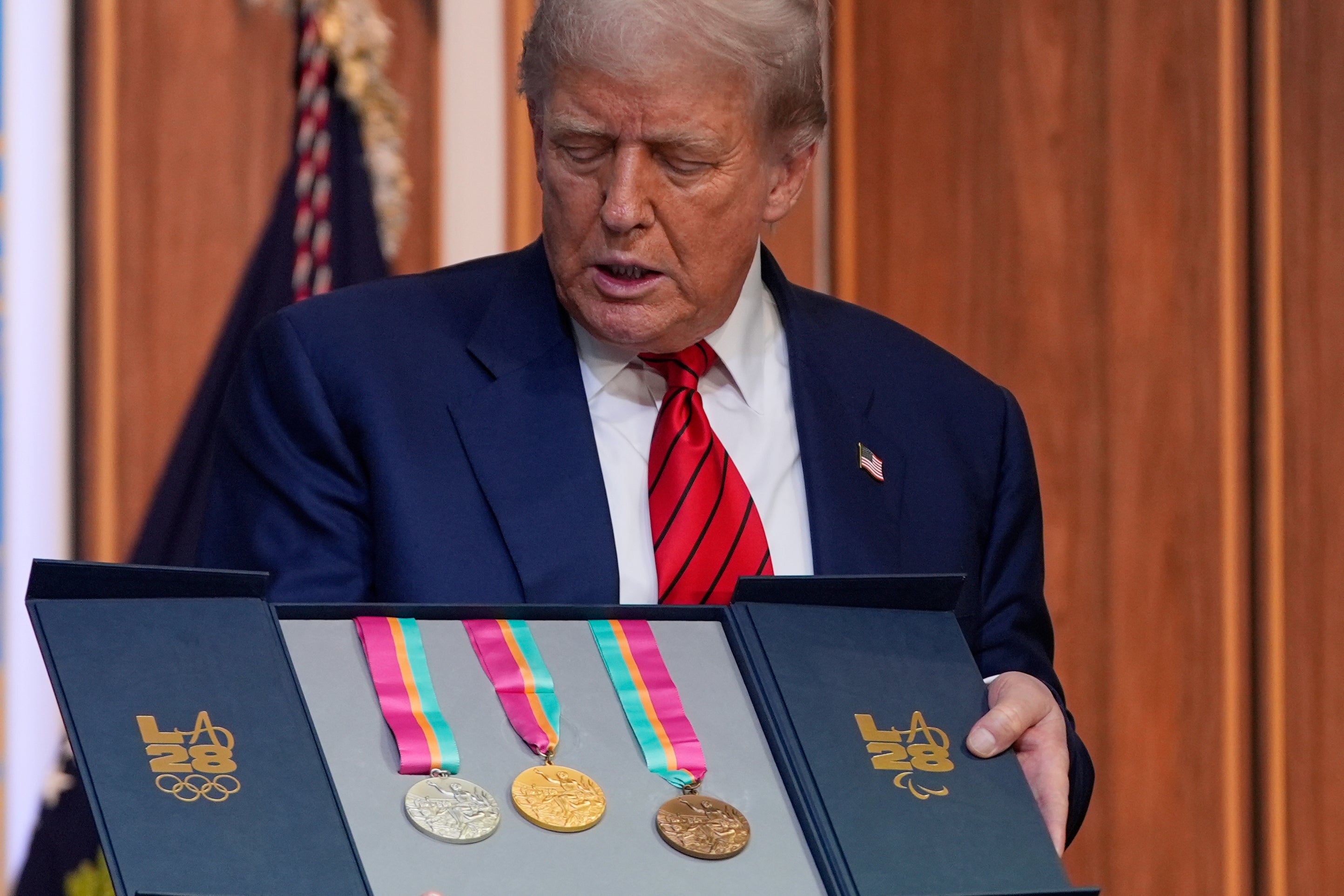 President Donald Trump accepted a set of medals from the 1984 Summer Olympics on Tuesday