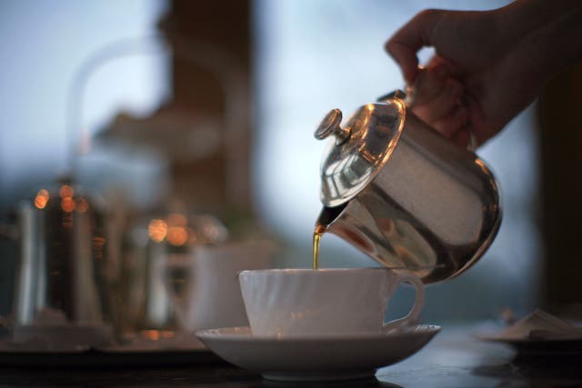 <p>A waitress pours tea at Bettys Tea Room, Harlow Carr on February 12, 2009 in Harrogate, England. </p>