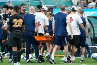 James Maddison left the pitch on a stretcher during Tottenhamโs 1-1 draw with Newcastle in Seoul (AP Photo/Ahn Young-joon/PA)
