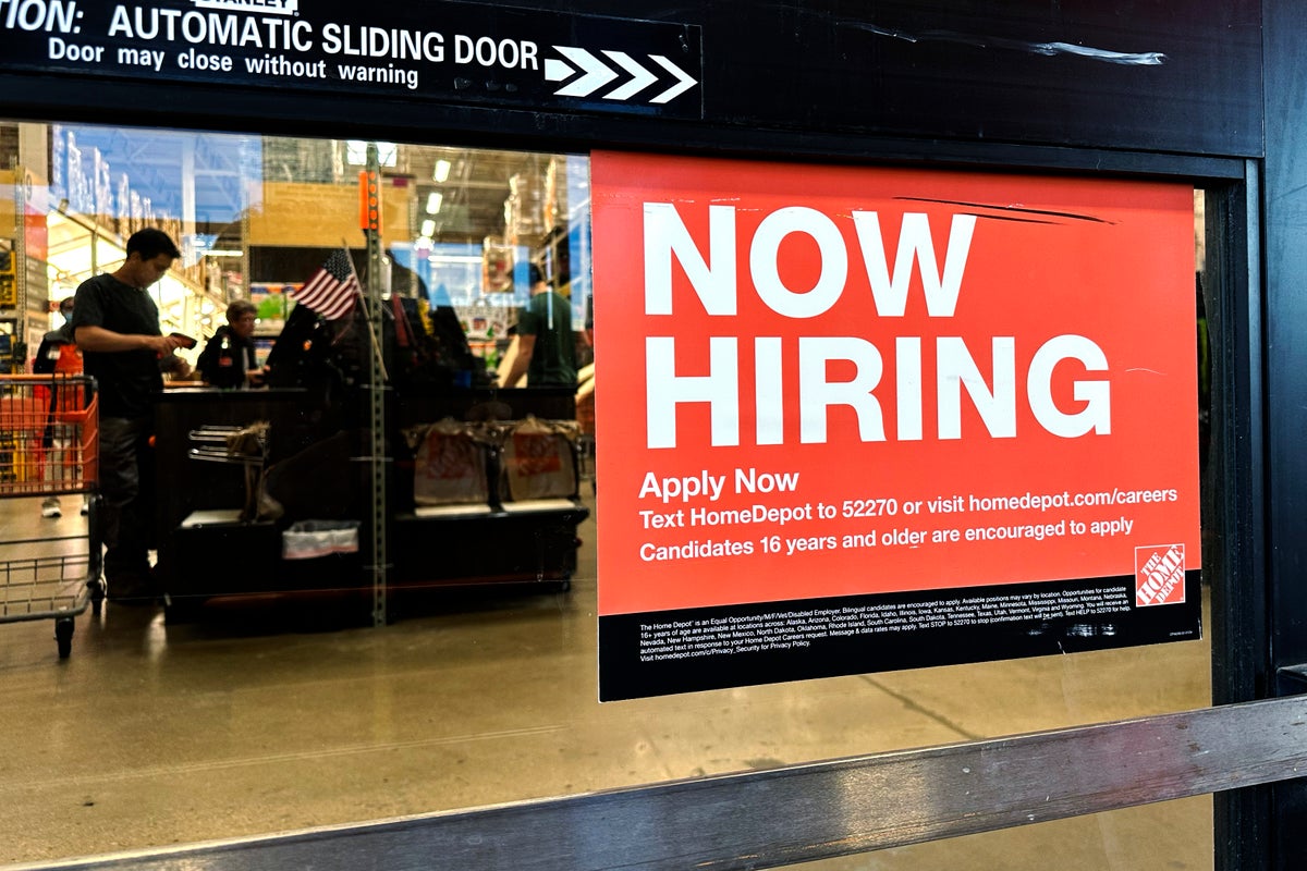US applications for jobless benefits rise modestly, but remain in a range considered healthy