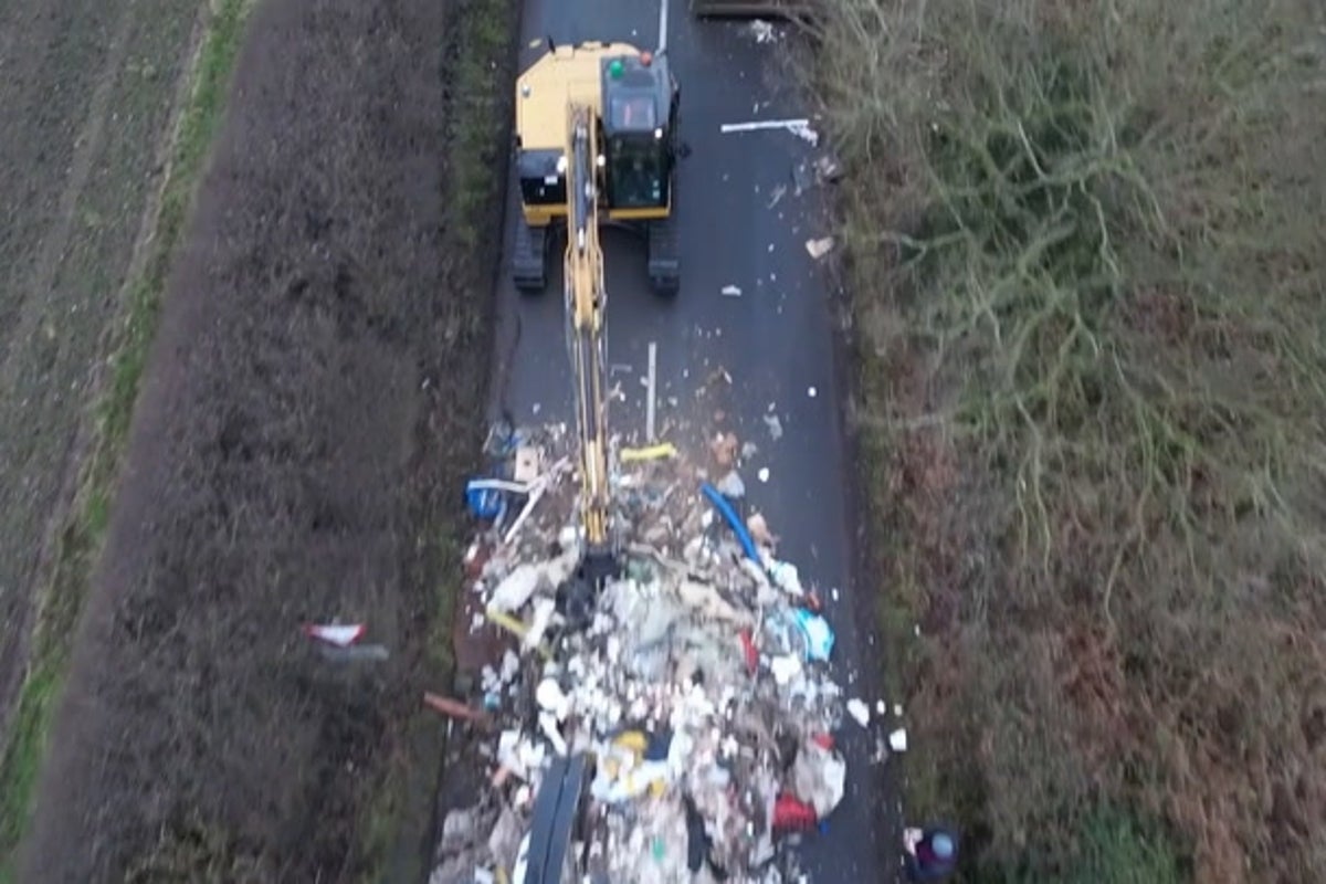 Man who allegedly fly-tipped 27 tonnes of waste on rural lane, trapping locals, to face trial
