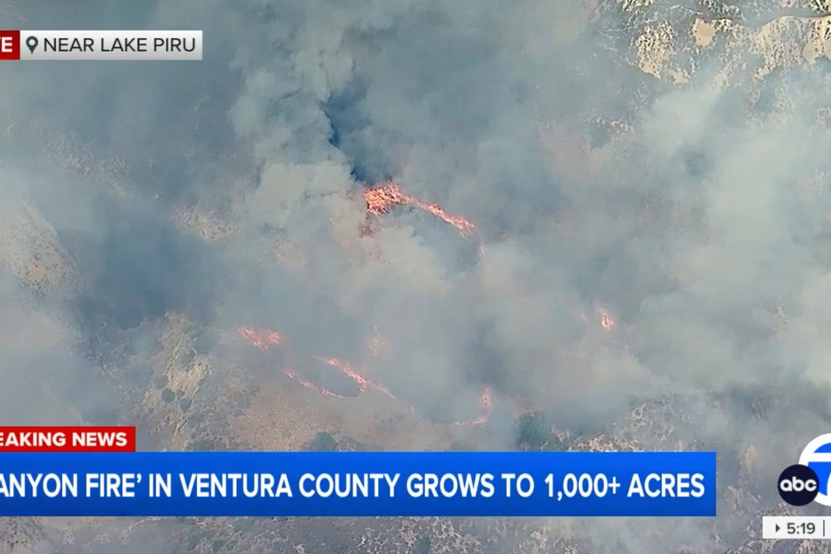 Rapidly spreading brush fire forces evacuations north of Los Angeles