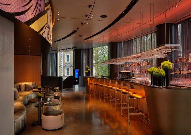 <p>The sleek bar at art'otel bar, Hoxton, London also has artwork by D*Face</p>