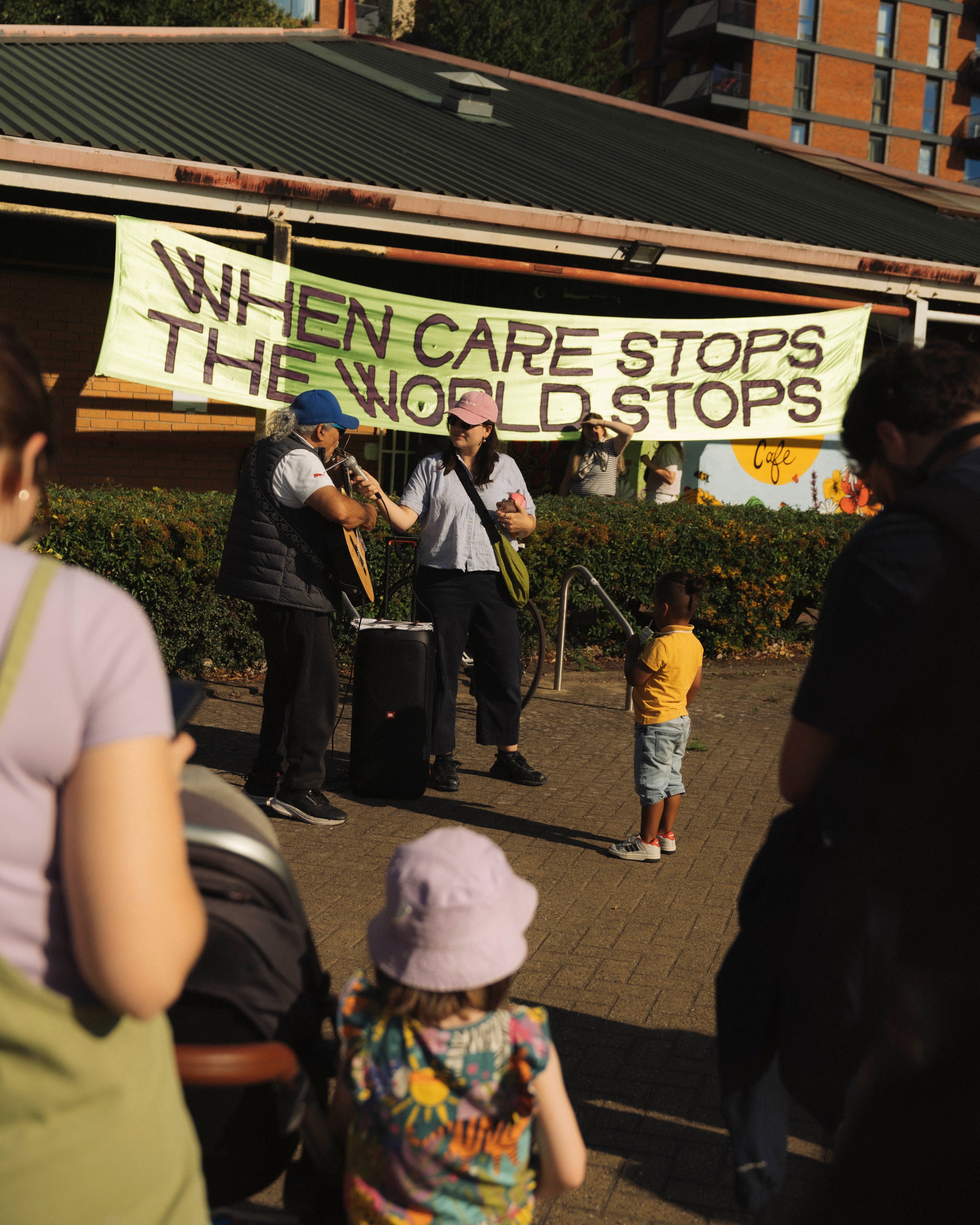 A small car blockade at the entrance and outside a family festival, protesters have also been designed to run a program of free food and children's activities from space.