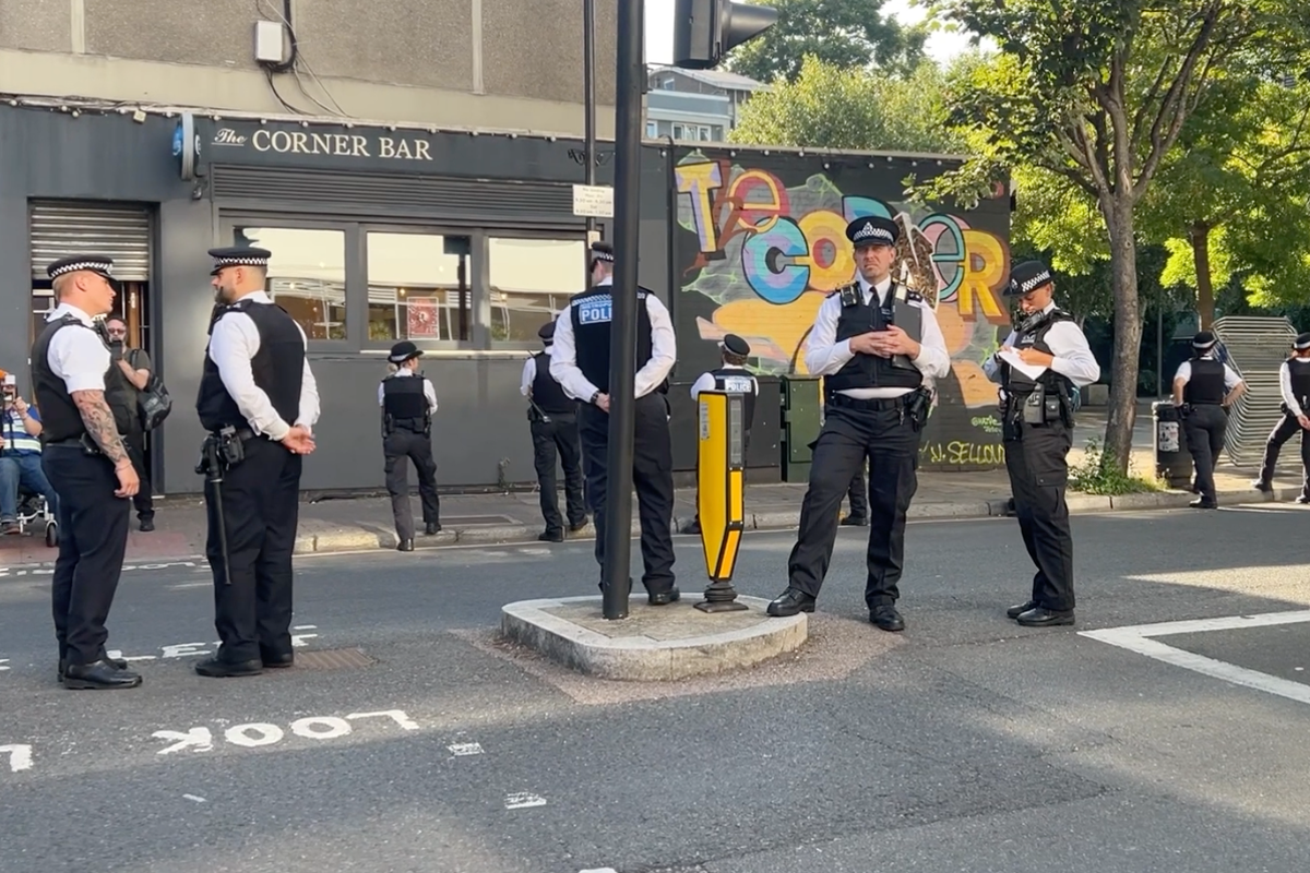 Police outnumber anti-migrant protesters outside Islington hotel