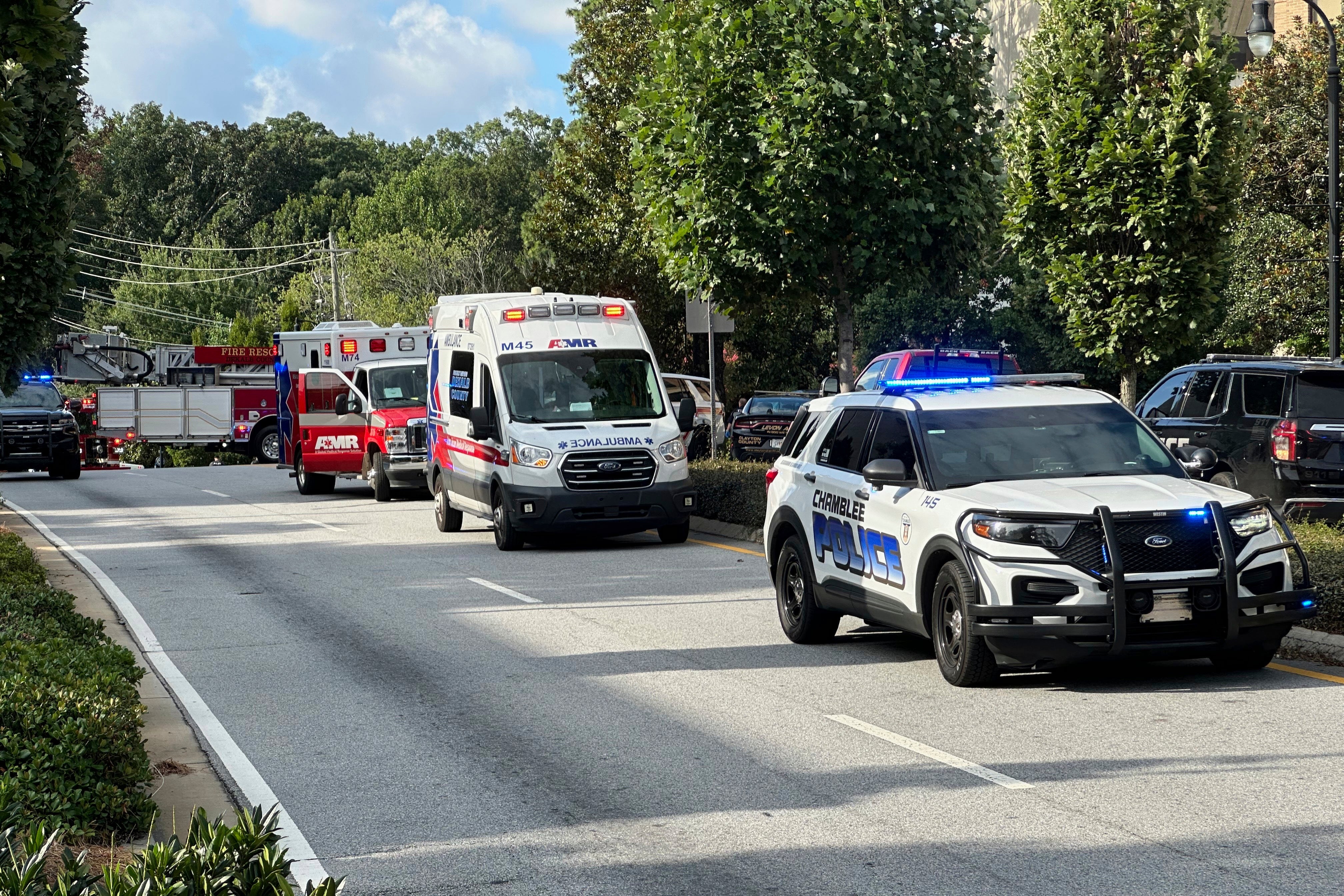 Emergency vehicles line up near Emory University and Centers for Disease Control and Prevention headquarters