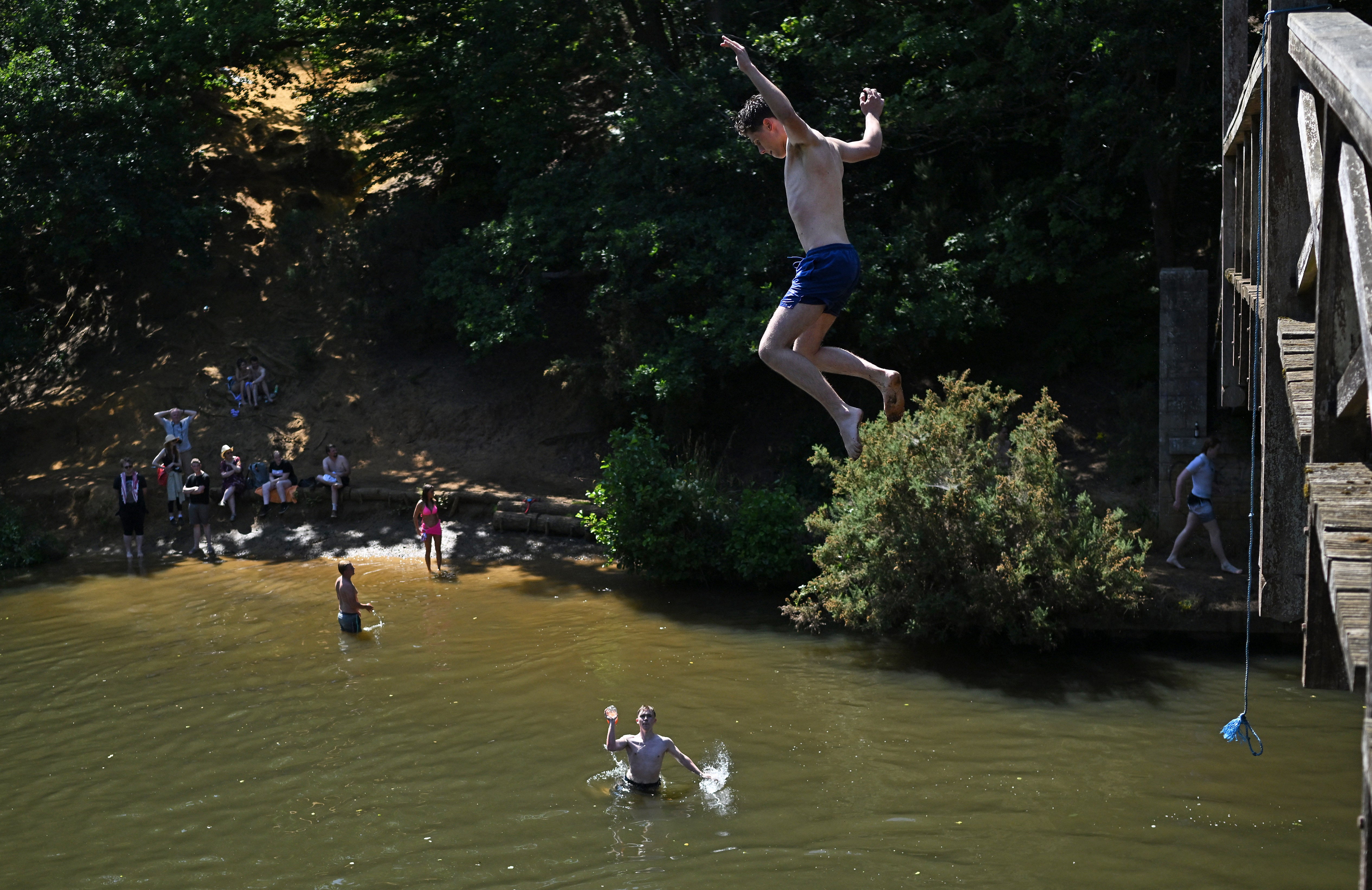 Teenagers jumped from the V Footbridge at Wei River Wei near Gildford in the south of London