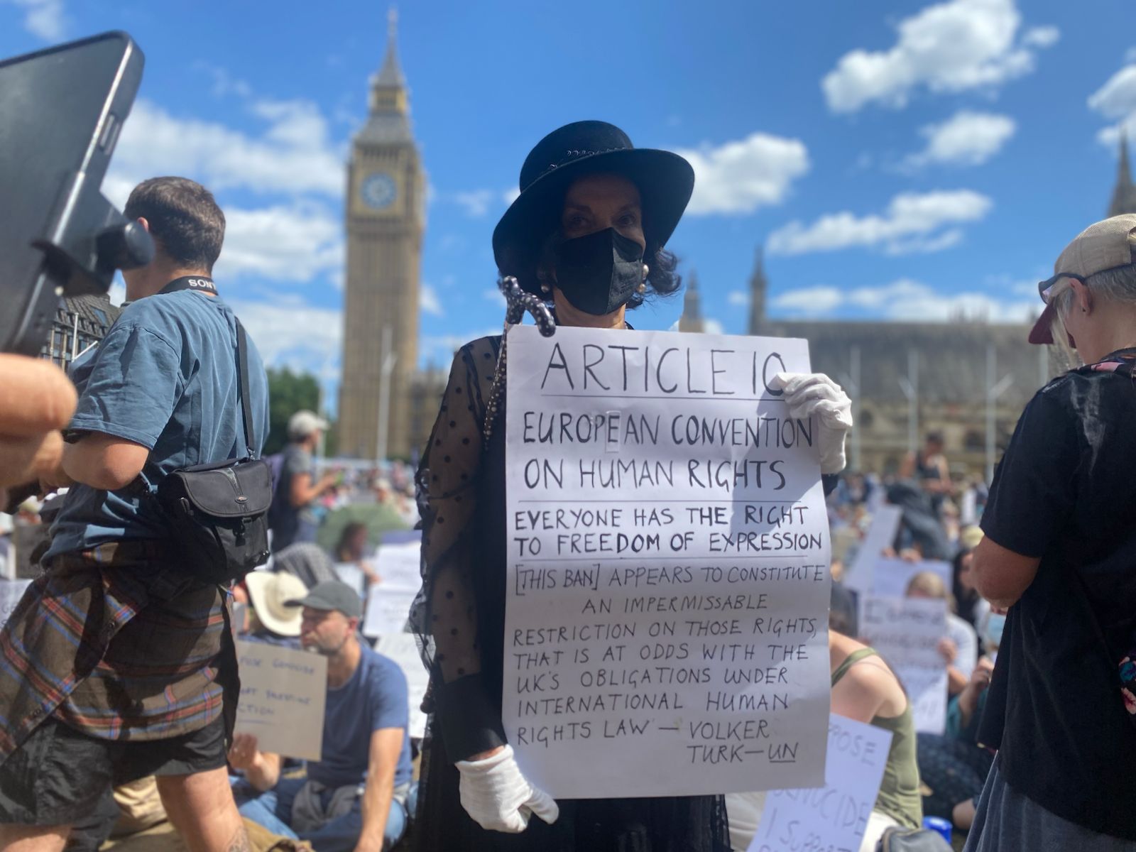 Bianca Jagger stood on side lines of action in Parliament Square today
