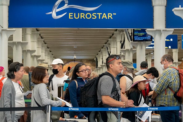 Eurostar passengers and Holidackers queue