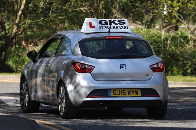 Driving test candidates should be asked if they would like their examiner to be ‘chatty’ or ‘formal’ to boost female pass rates, a report commissioned by a Government agency has suggested (Gareth Fuller/PA)