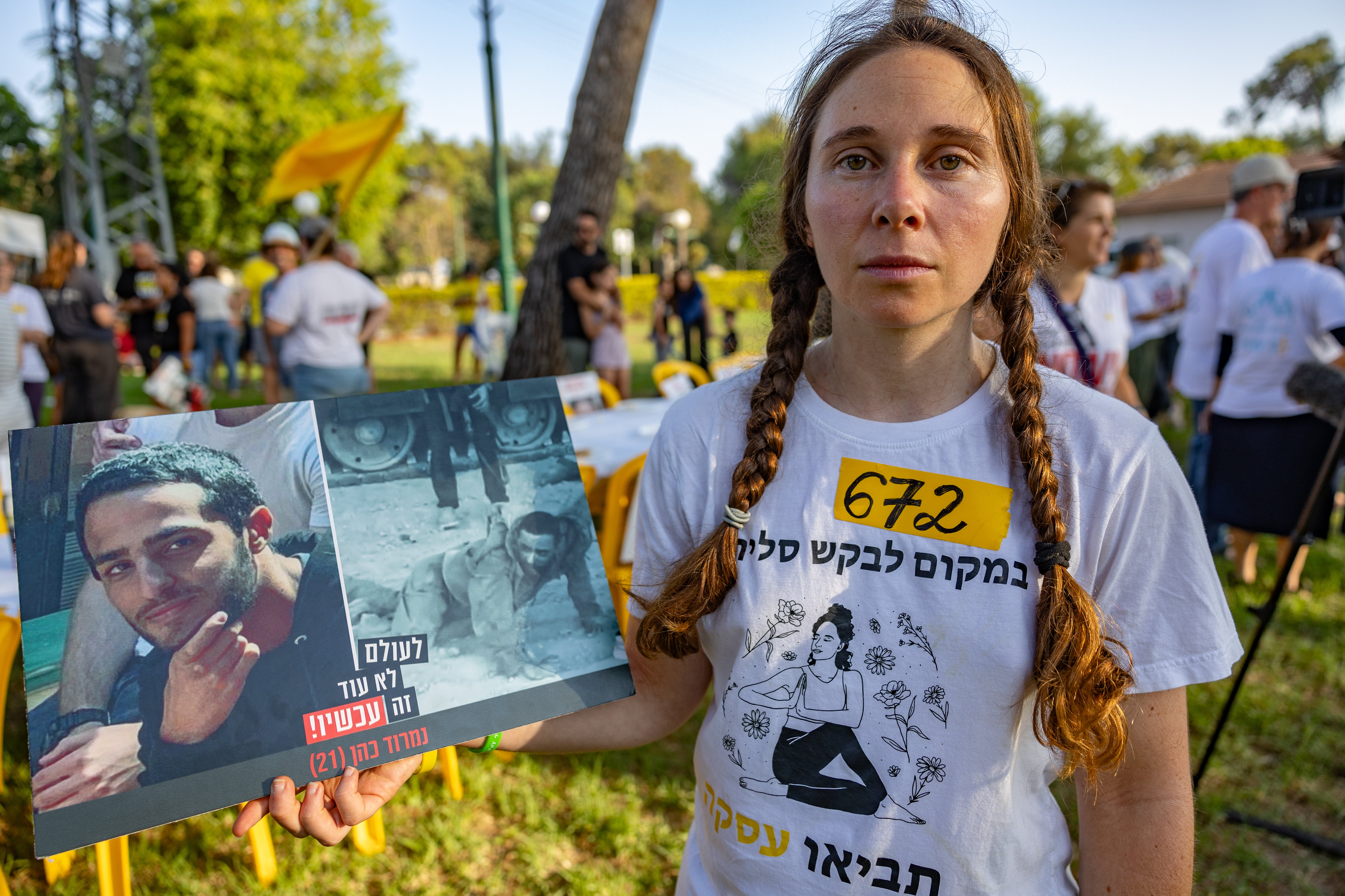 Shay Dickmann, whose cousin Carmel Gat, a hostage killed by Hamas after a November ceasefire collapsed, at a protest outside of the Israeli defence minister’s home