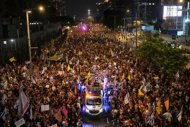 <p>Relatives and supporters of Israeli hostages held in the Gaza Strip attend a rally demanding their release from Hamas captivity and calling for an end to the war, in Tel Aviv, Israel, Saturday, Aug. 9, 2025</p>