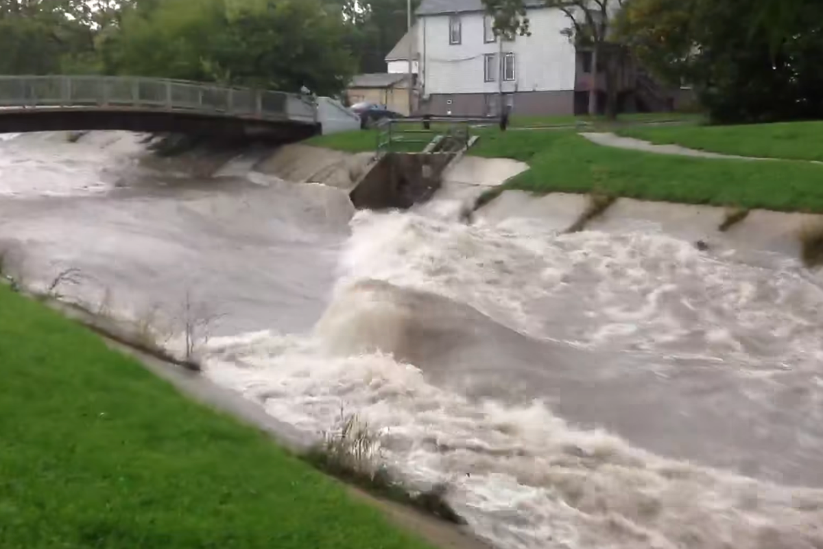 Torrential Midwest flash floods turn state fair into water park and shut airports and roads with more to come