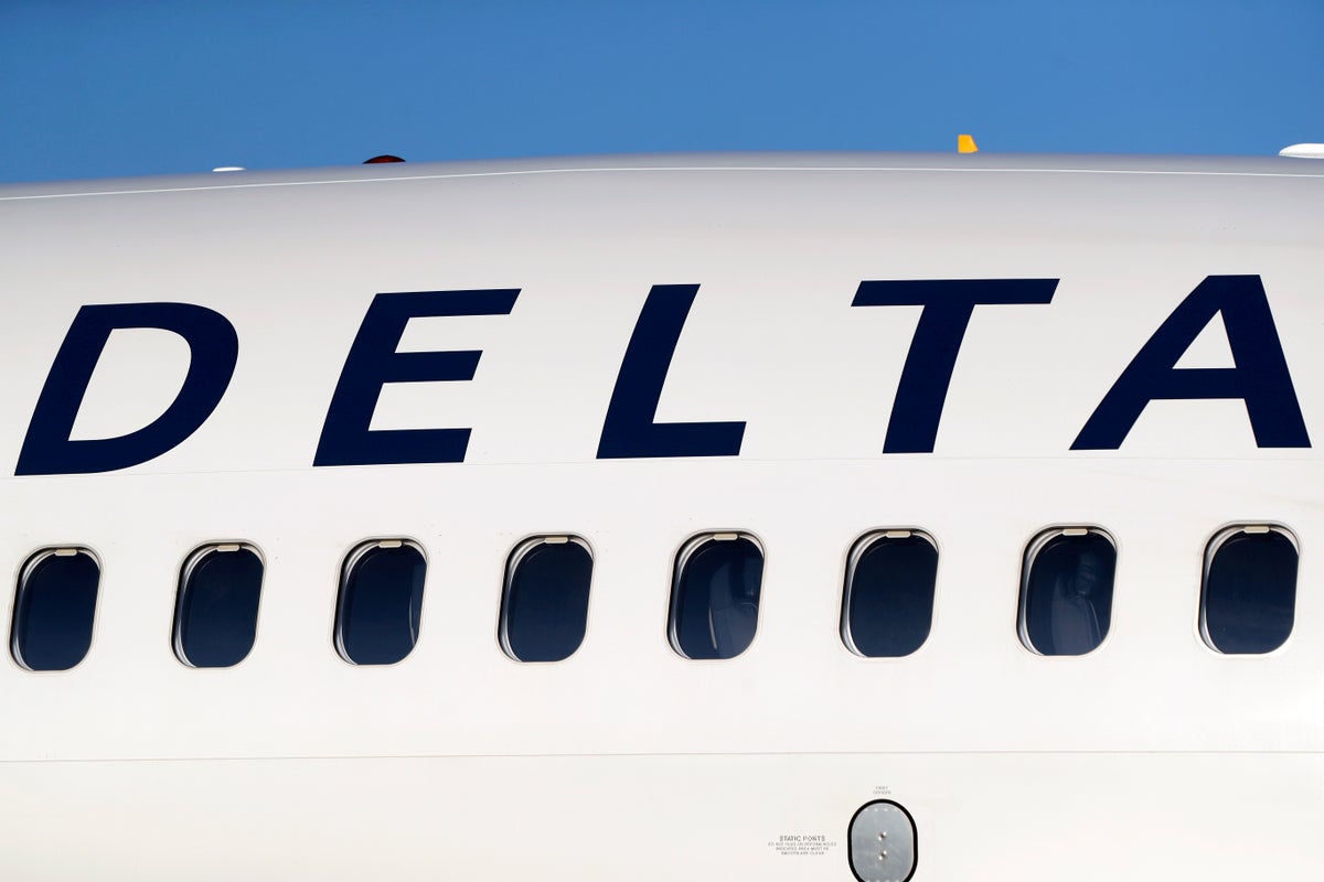 Delta plane wing clips empty aircraft during pushback from gate in Atlanta