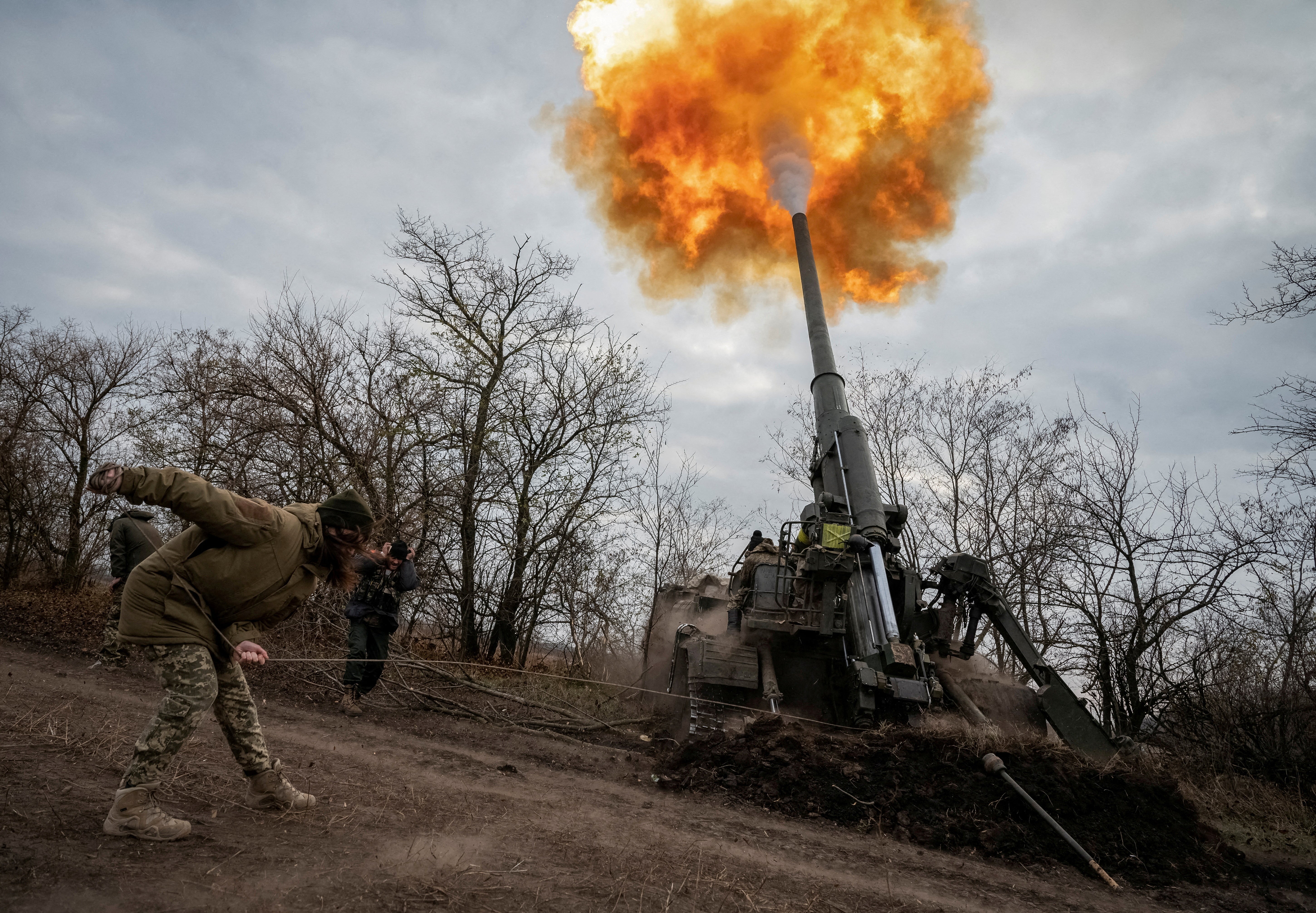 File photo: A Ukrainian servicewoman fires a 2S7 Pion self-propelled gun on a frontline in Kherson region