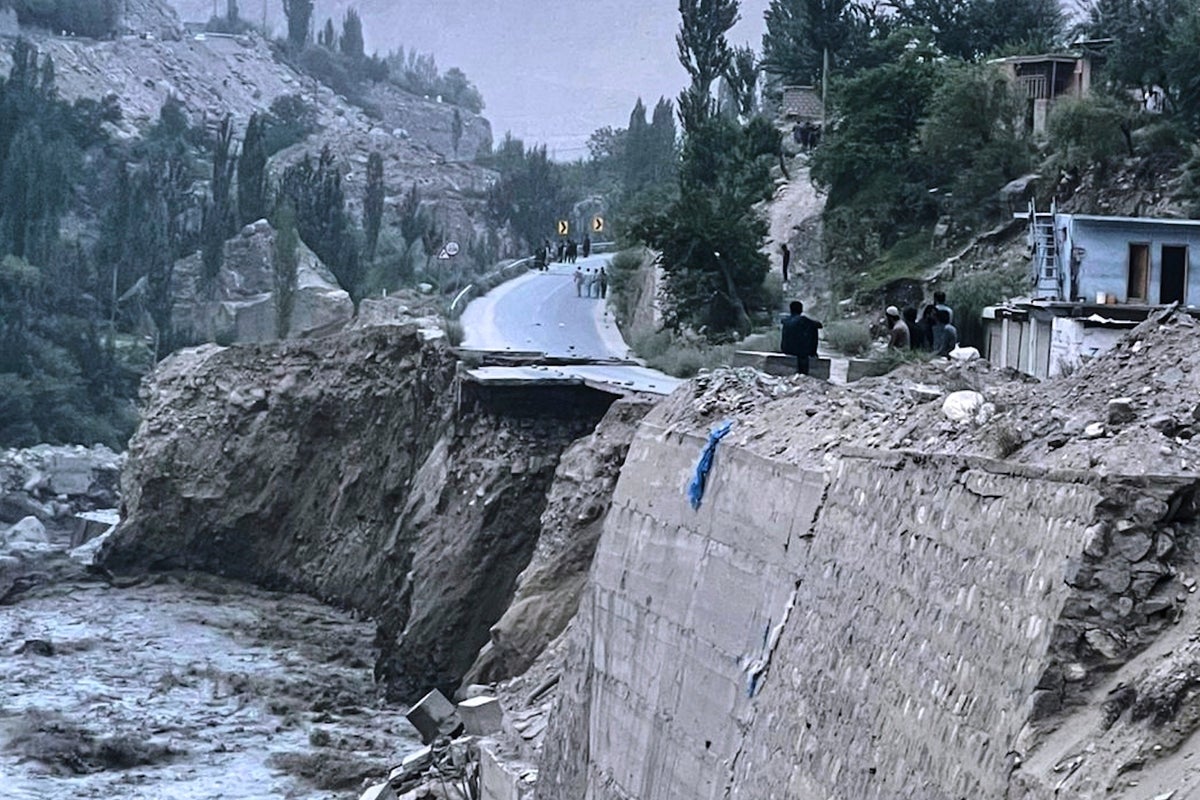 Flash floods triggered by heavy rains kill at least 49 people in northwestern Pakistan