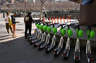 File. E-scooters for hire are lined up in Melbourne's central business district
