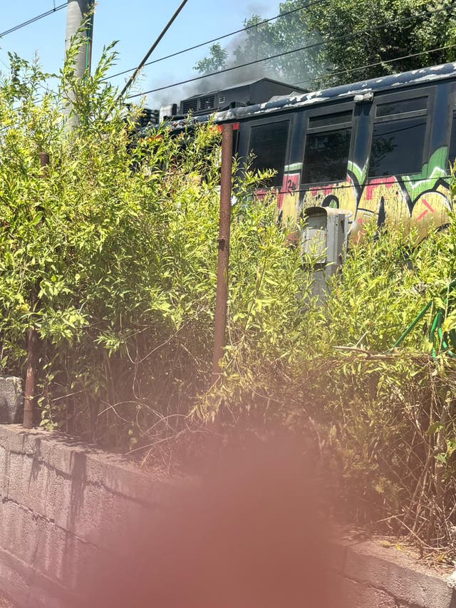 <p>Smoke billowed from the top of the train as passengers self-evacuated from the carriage</p>