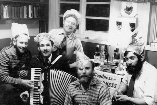 <p>Dennis 'Tink' Bell (far right) during Christmas festivities at Admiralty Bay Base on King George Island in 1958</p>