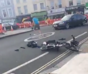 Police investigating vigilante who flung bike in front of moving car