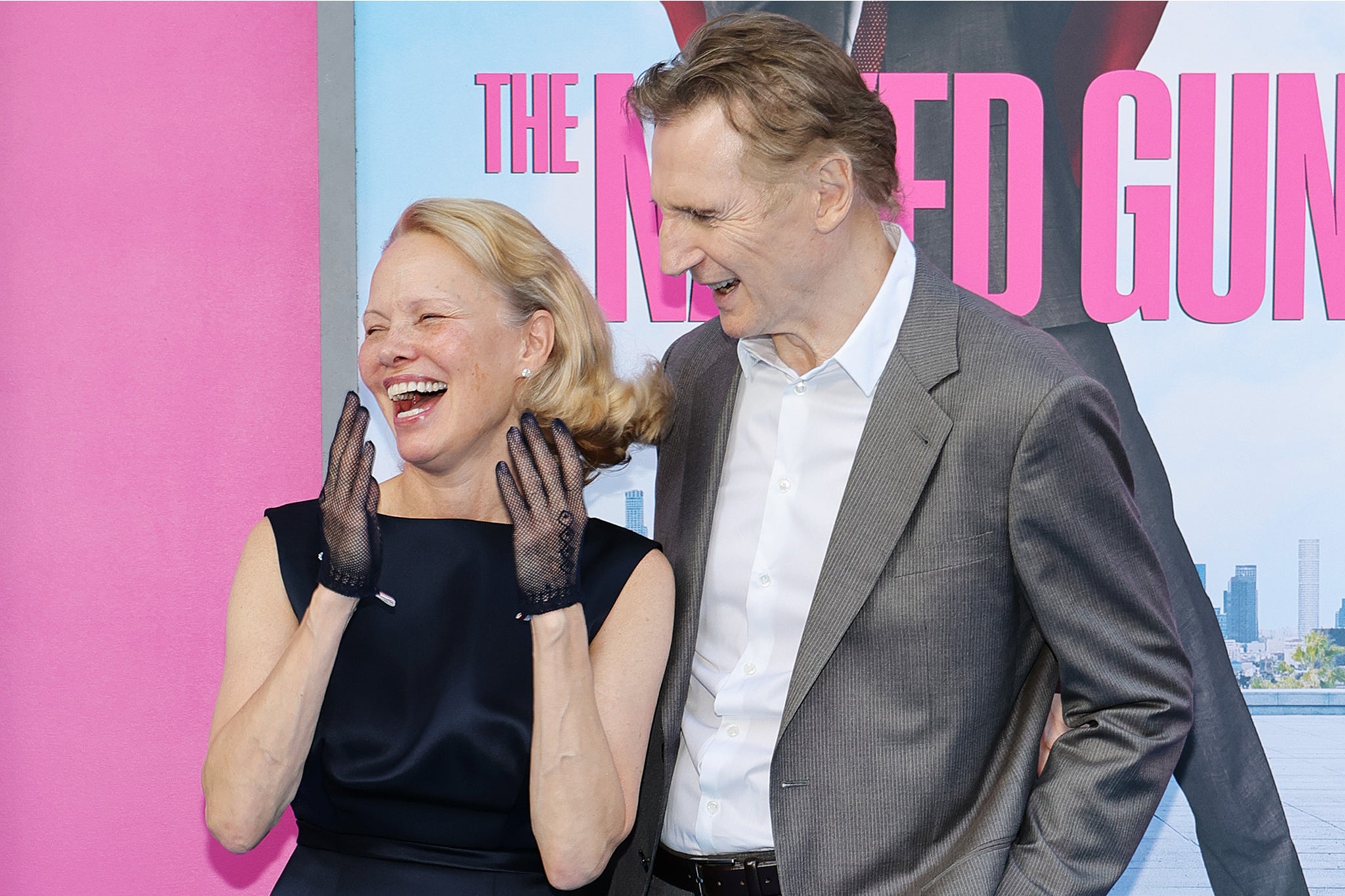 ‘He’s so giving and generous and was so complimentary and supportive that, you know, you can’t help but fall in love with Liam,’ Anderson said about Neeson