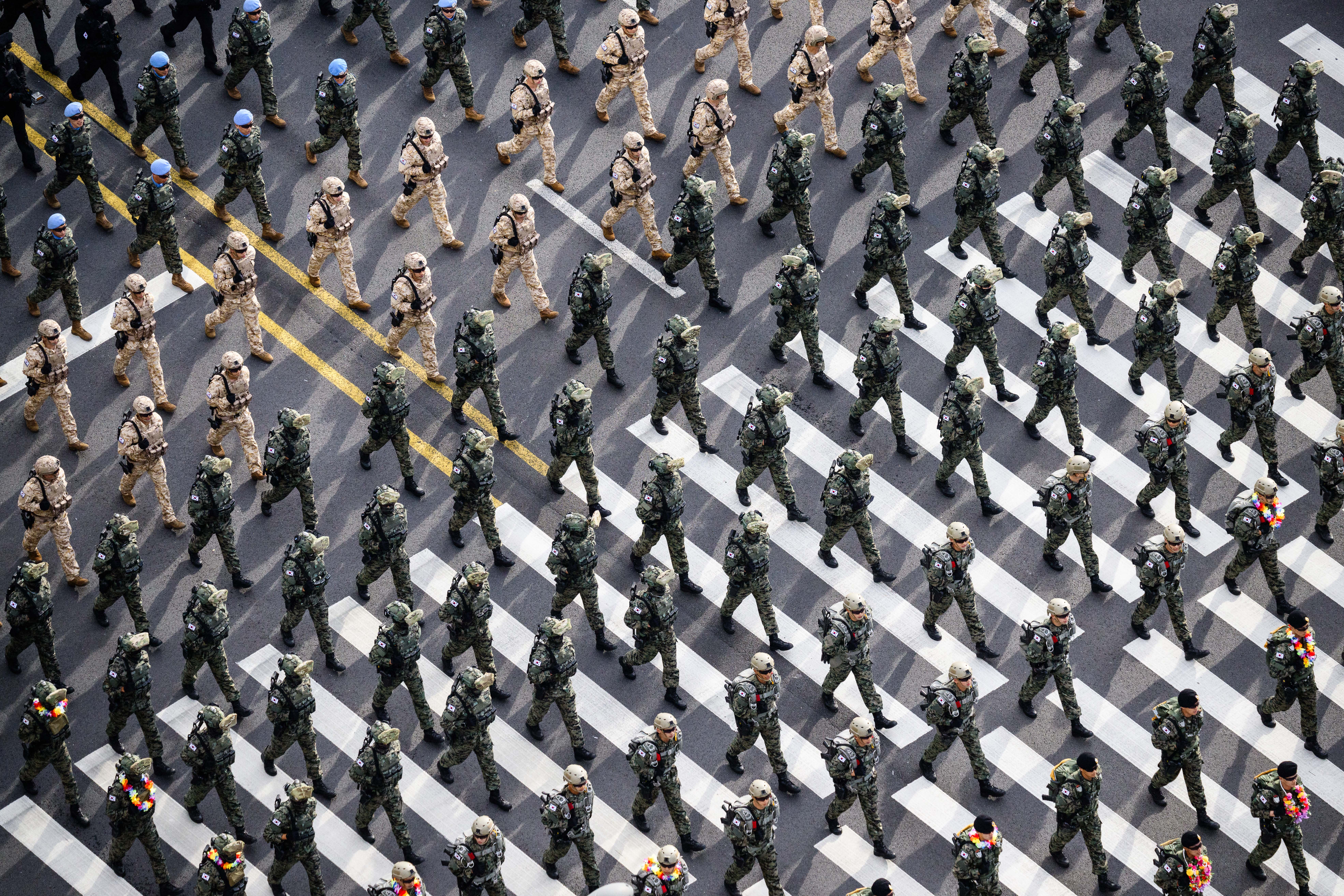 <p>Soldiers march during a military parade to celebrate South Korea's 76th Armed Forces Day in Seoul on 1 October 2024</p>