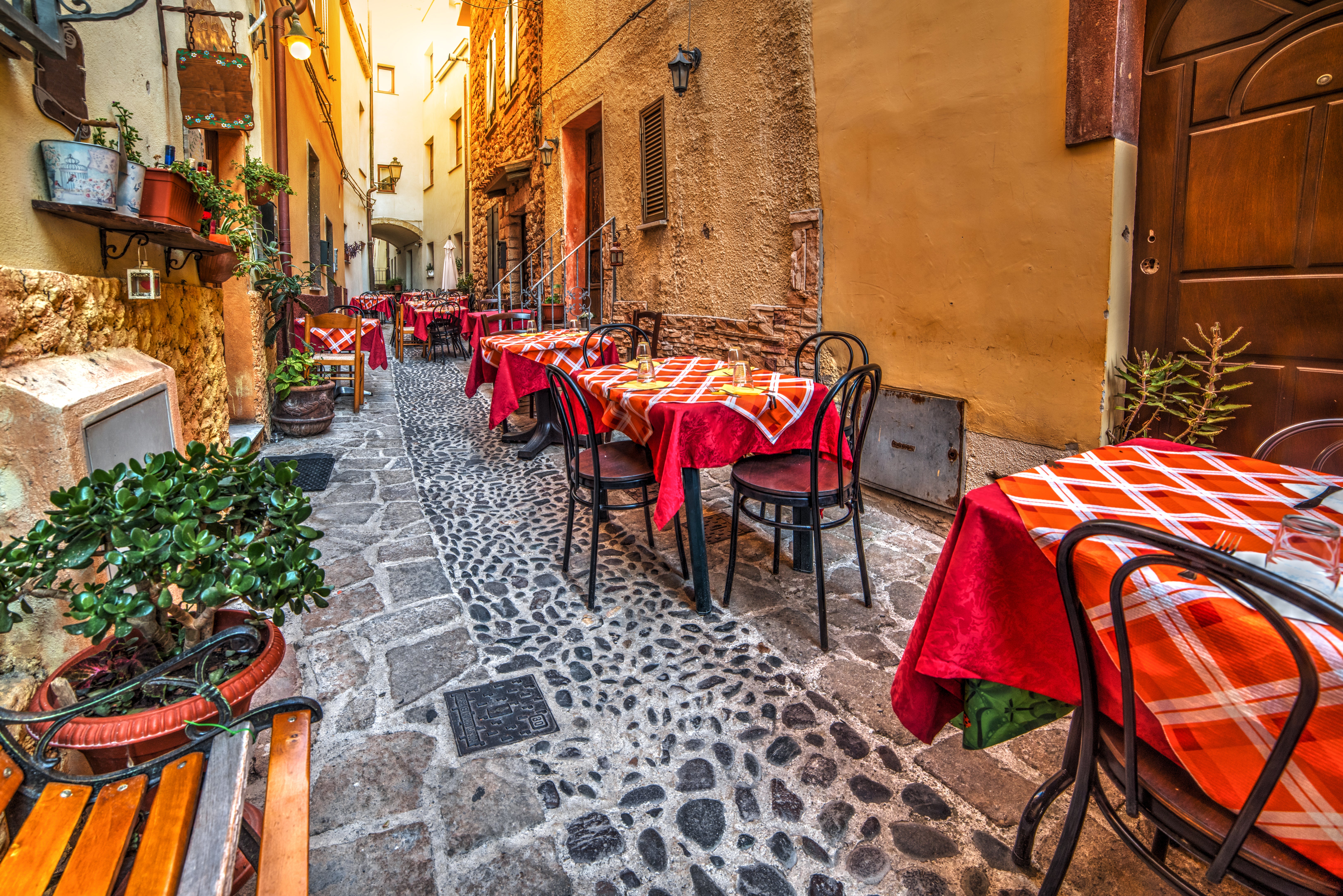 Try delicious Sardinian cuisine, from sheep’s cheese to roast meat, at a traditional trattoria