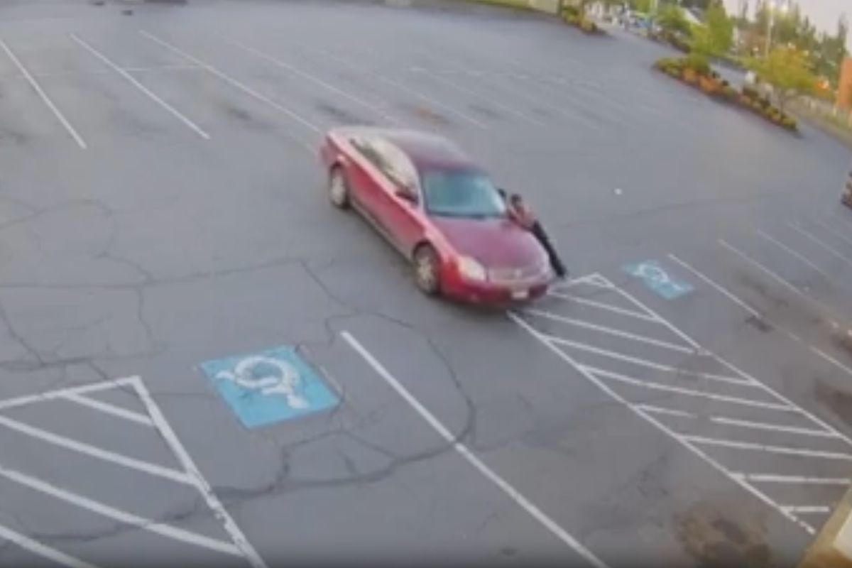 Moment car rams into restaurant twice after failed towing attempt