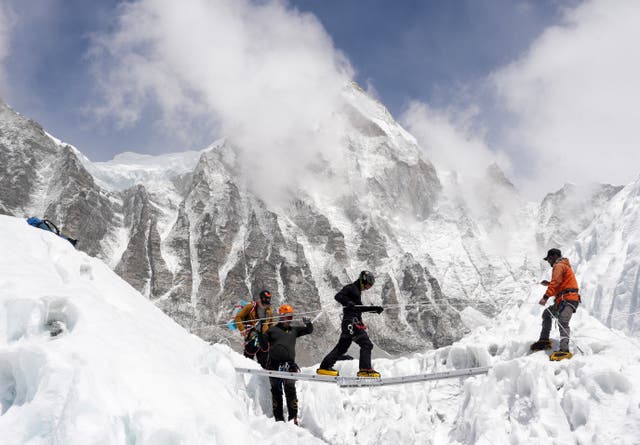 <p>File. Mountaineers practice walking on a ladder during a training session at Everest base camp, Nepal, 15 April 2025</p>