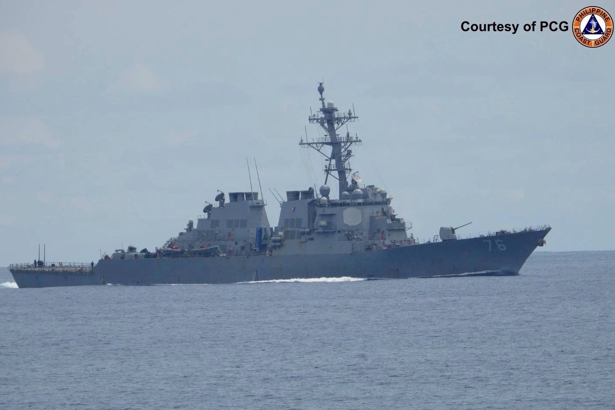 US briefly deploys 2 warships to a disputed South China Sea shoal after Chinese collision
