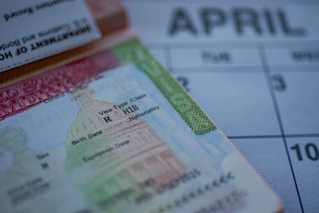 <p>An H-1B visa stamp for specialty workers seen in a travellers’ passport as the White House approves a plan to revamp the program by which they are awarded</p>