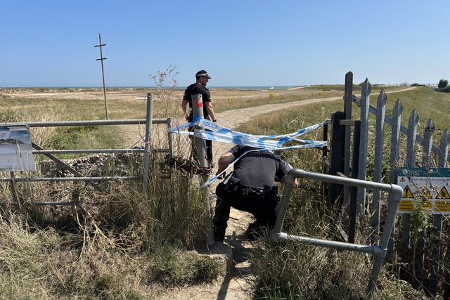 Police at the scene in the Leysdown-on-Sea resort on the Isle of Sheppey after a man in his 40s died after being attacked during an altercation. Three teenagers have been arrested over the murder. A police cordon has been set up in a large clearing behind the beach in the Leysdown-on-Sea resort, in front of a caravan park. Picture date: Monday August 11, 2025.
