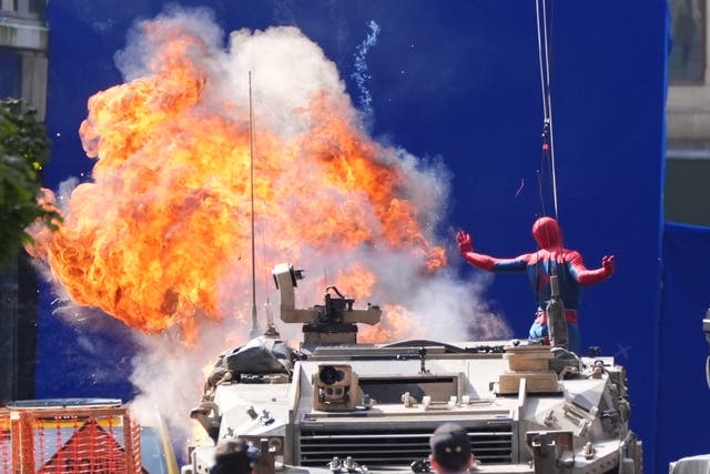 <p>A person in a Spider-Man suit during filming on Hutcheson Street in Glasgow for the latest film in the Spider-Man franchise, Spider-Man: Brand New Day</p>