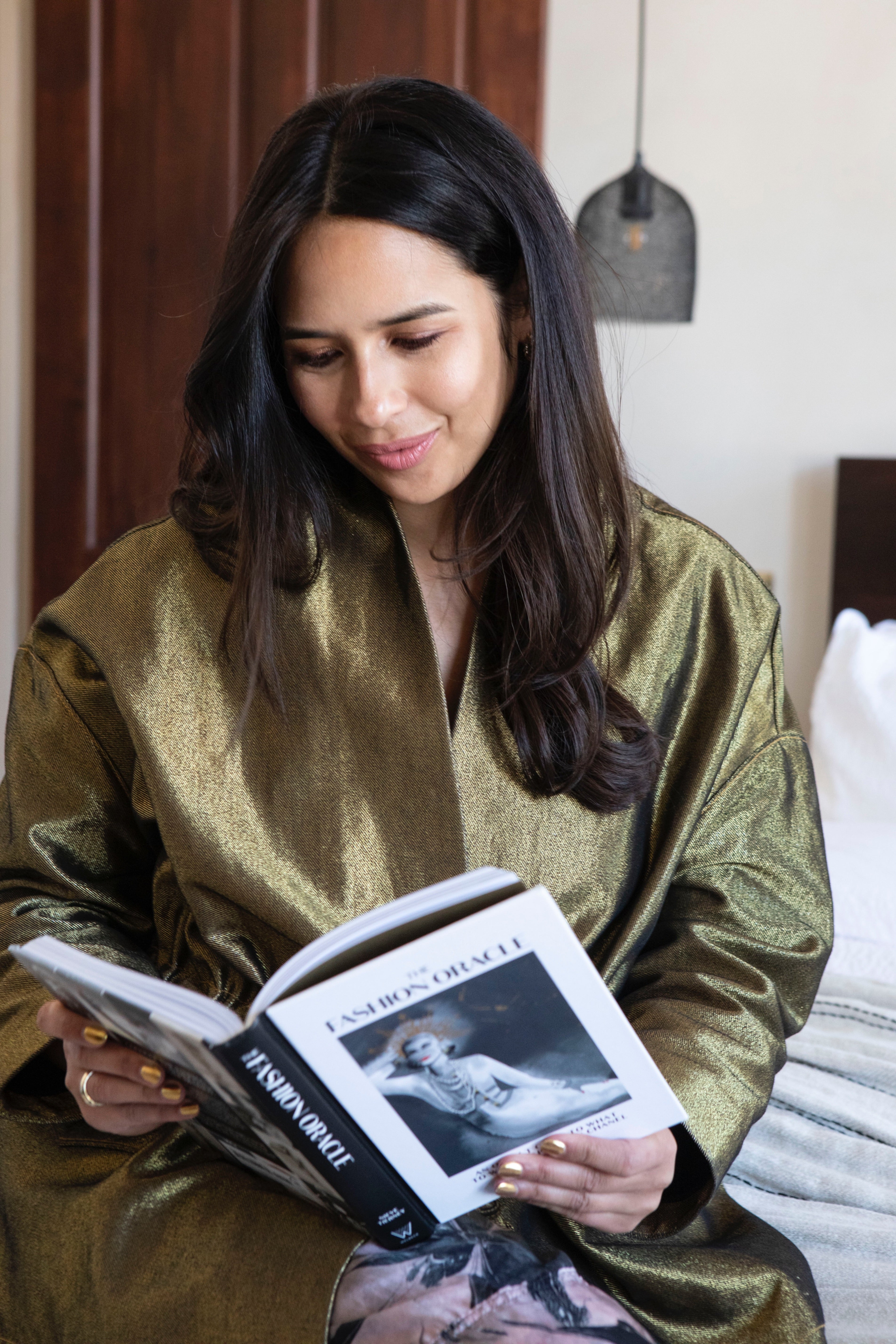 Nieve Tierney with her book ‘The Fashion Oracle’ that helps you to align your wardrobe with your intentions