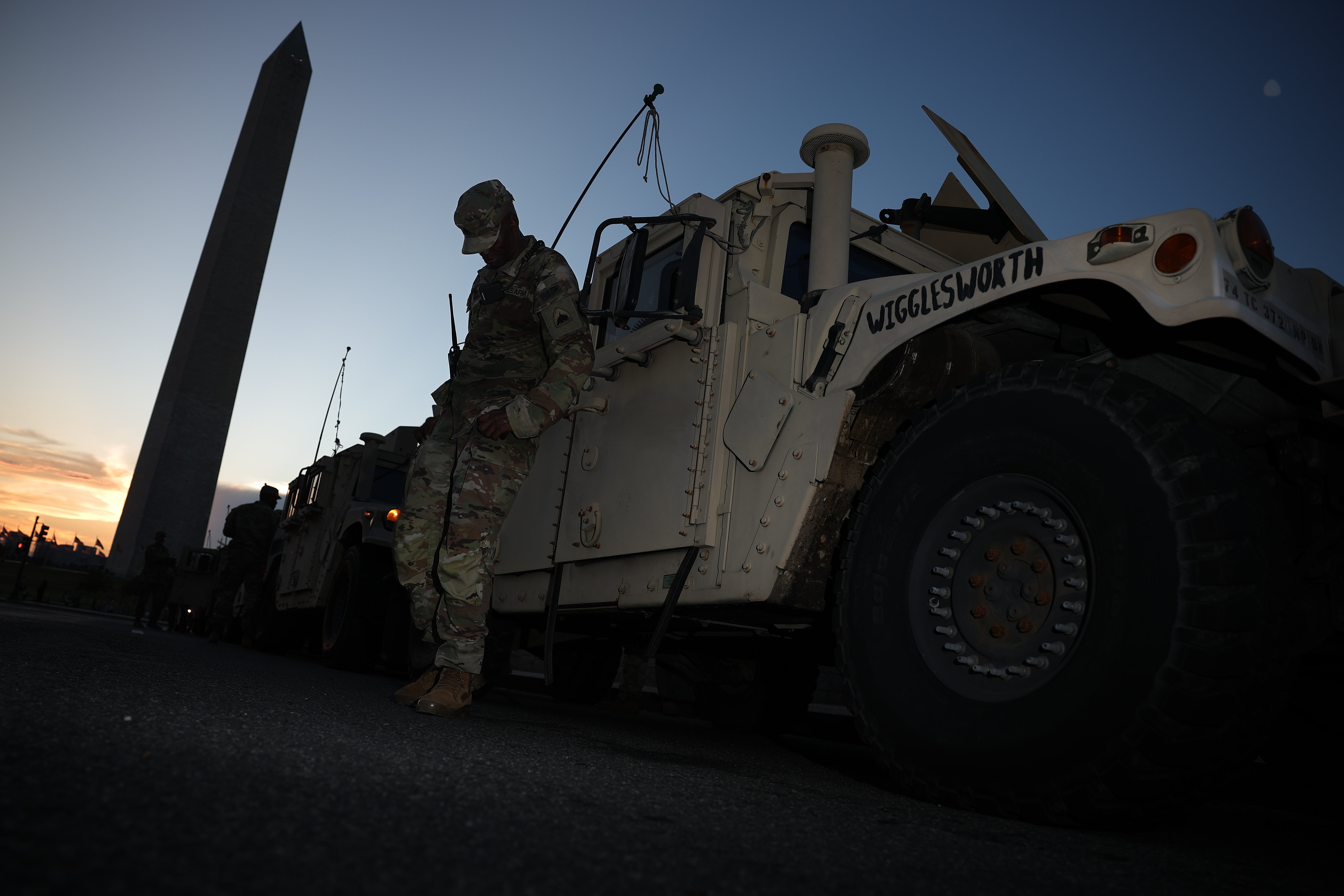 Members of the National Guard patrol near the Washington Monument on Tuesday evening