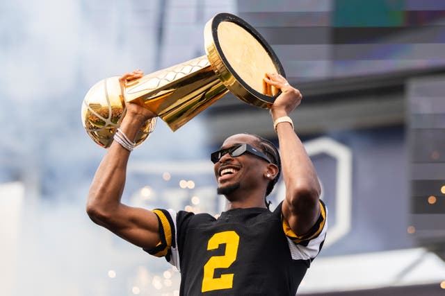 <p>Oklahoma City Thunder's Shai Gilgeous-Alexander holds up the Larry O'Brien Trophy during a ceremony honoring the NBA basketball champion, Thursday, Aug. 7, 2025, in Hamilton, Ontario. (Nick Iwanyshyn/The Canadian Press via AP)</p>