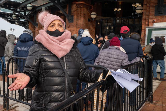 <p>A frustrated person after waiting on line to enter a coronavirus (COVID-19) vaccination site at Citi Field is told she must make an appointment on February 10, 2021 in the Queens borough of New York City.</p>