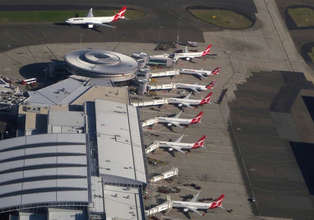 <p>File: Planes are parked at the domestic terminal at Sydney airport in Australia, 1 July 2017</p>