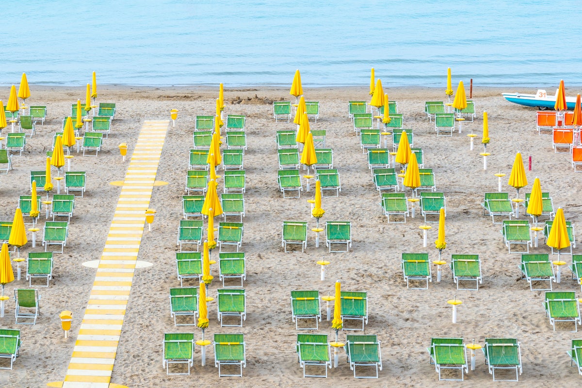 Italians leave local beaches as summer sunbed costs spike