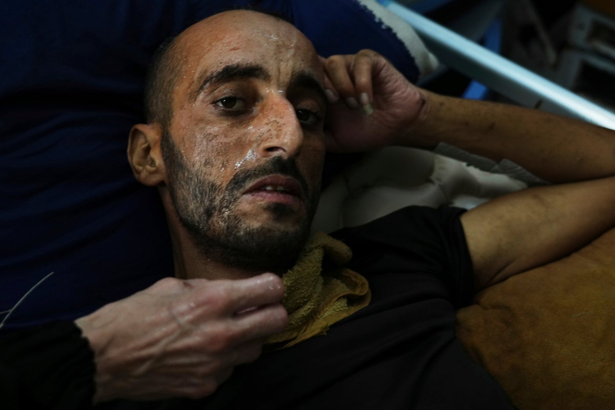 Photos of displaced people in Gaza battling stifling amid food and water shortages