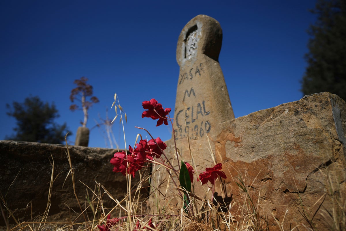 Grave by grave, a new project in divided Cyprus tries to mend mistrust