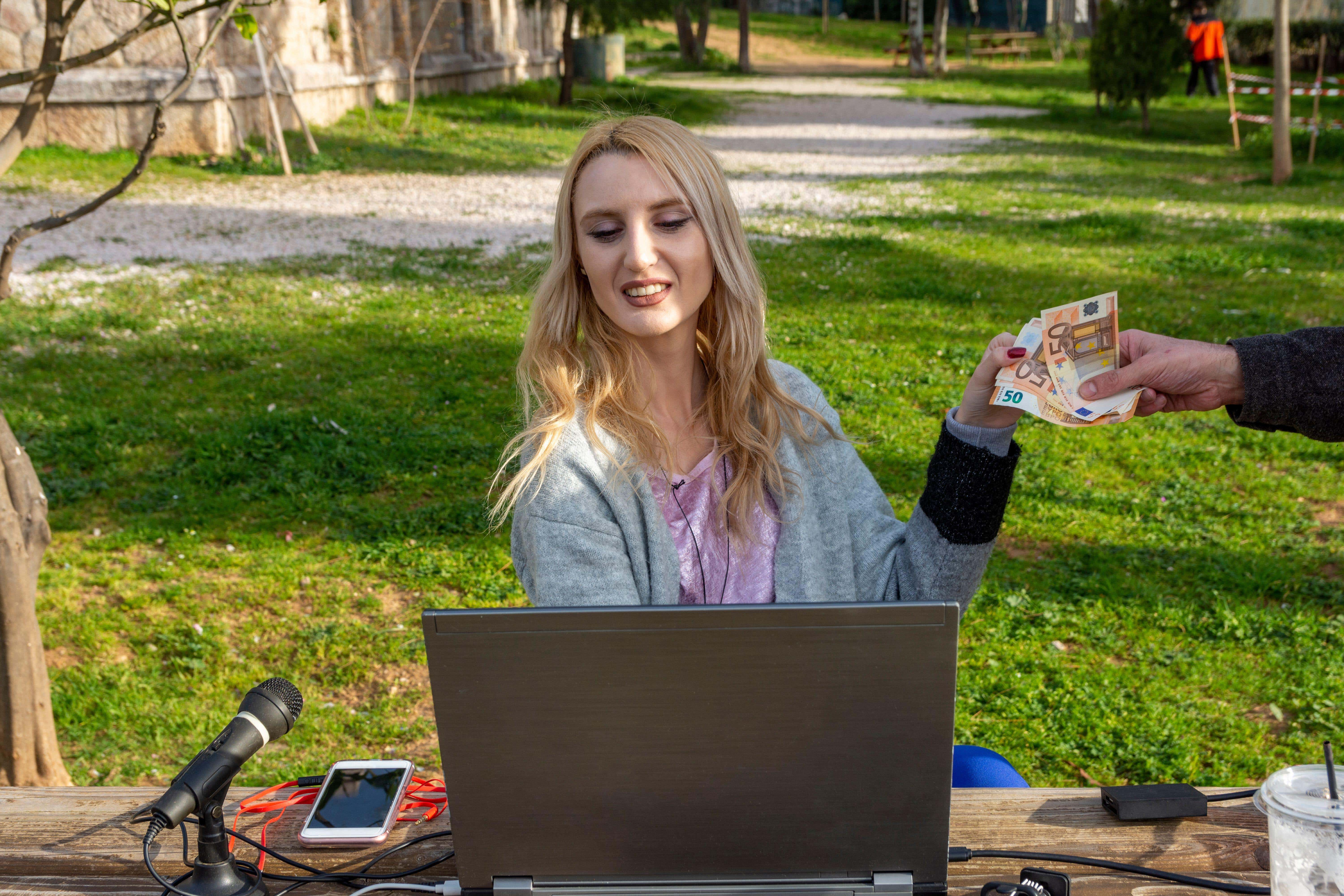 Exam chiefs have suggested that influencers who appear to be making lots of money may be driving up interest in business-related A-level courses (Alamy/PA)