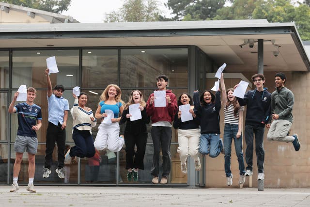 Students receiving their A-level results at Rathmore Grammar School in Finaghy, Belfast (Liam McBurney/PA)
