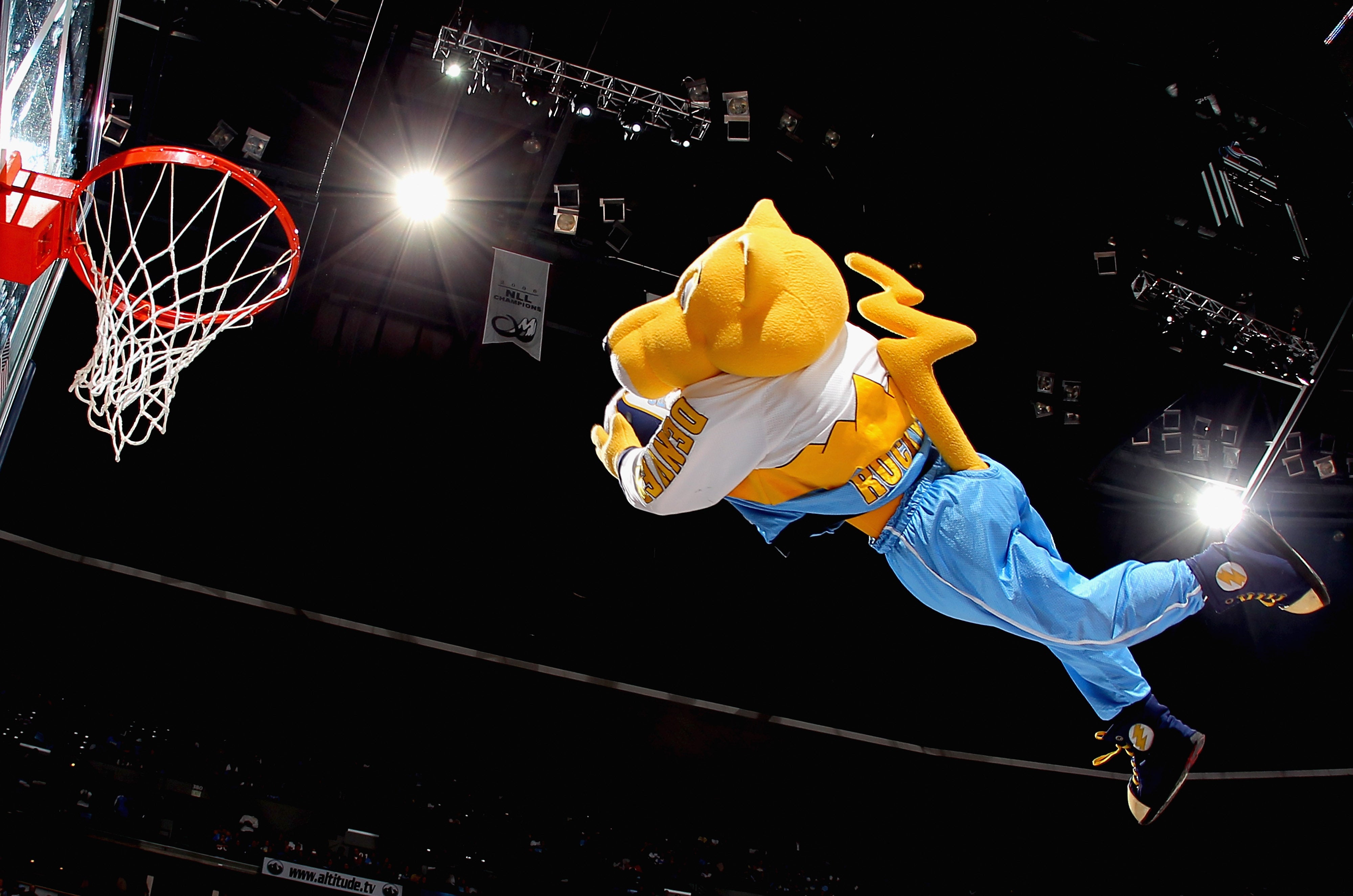 The longtime mascot of the Denver Nuggets is suing the NBA team’s parent company, claiming wrongful termination after he underwent hip replacement surgery.