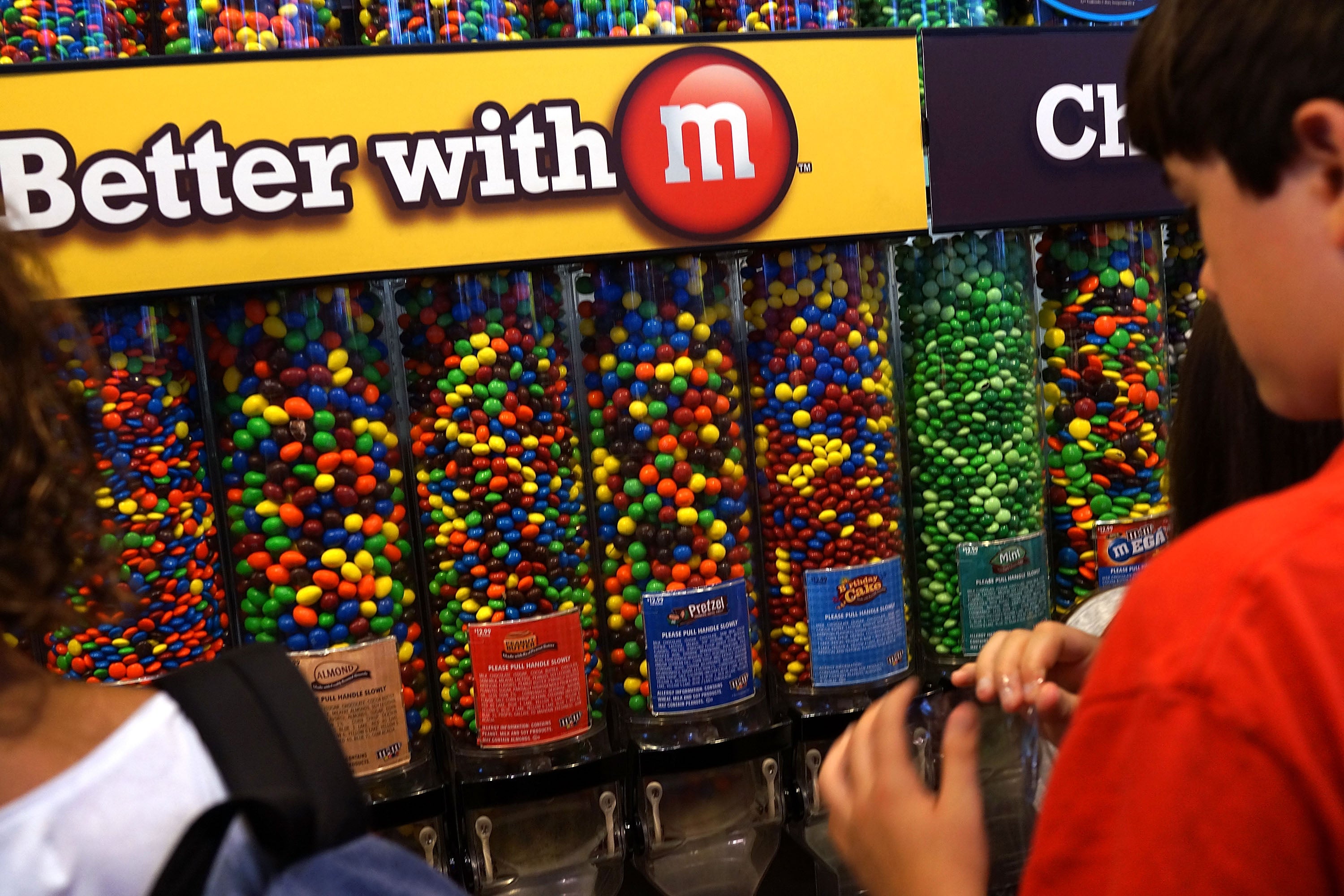 People visit the M&M’s store in New York City. The candy’s maker Mars Wrigley is one of multiple companies that’s announced plans to respond to the Trump administration’s push to ‘Make America Healthy Again’