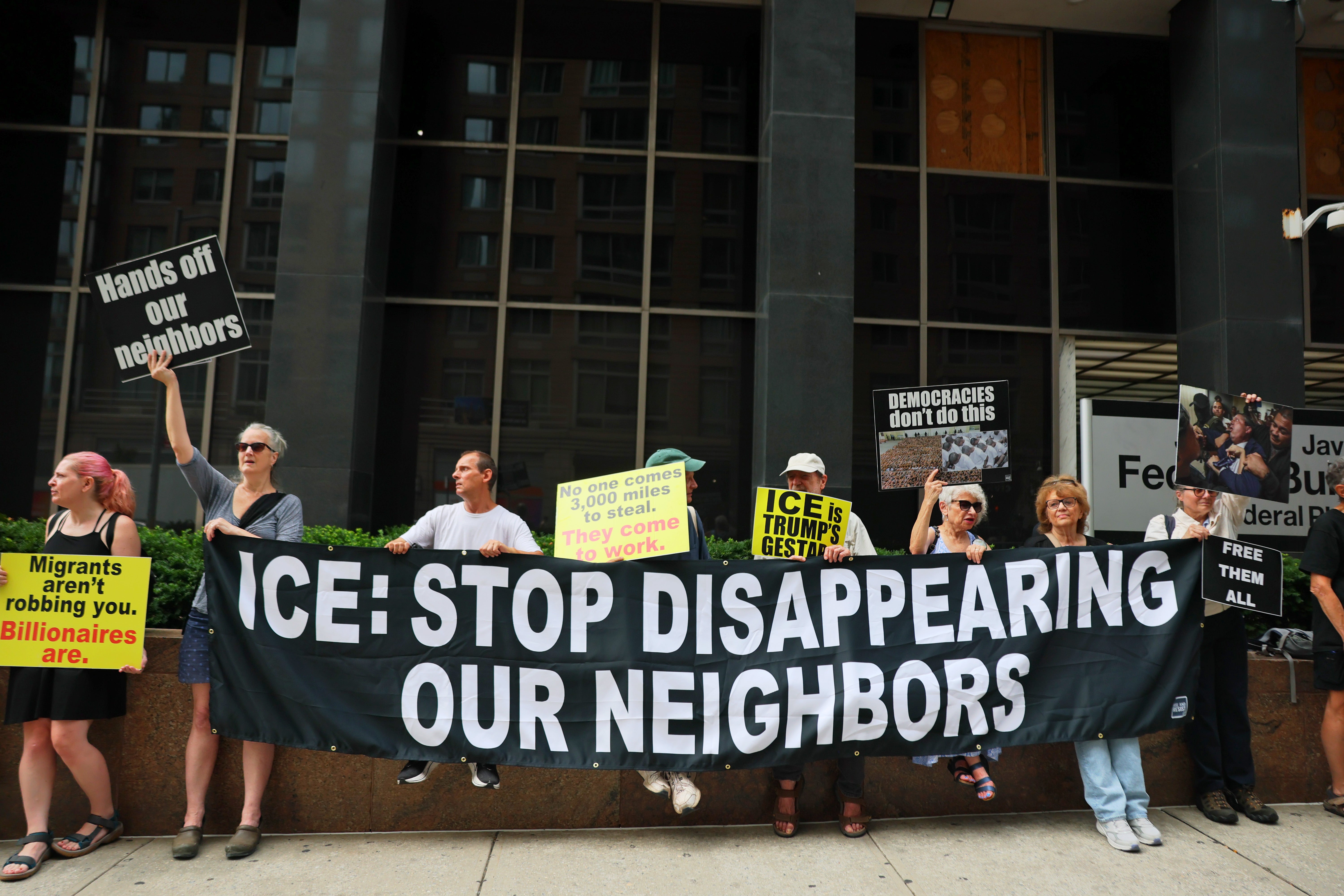 Protesters outside the government building amid President Donald Trump’s anti-immigration crackdown