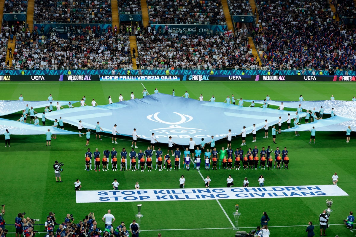 ‘Stop Killing Children’ banner displayed by Uefa at Super Cup ‘Stop Killing Children’ banner displayed by Uefa at Super Cup