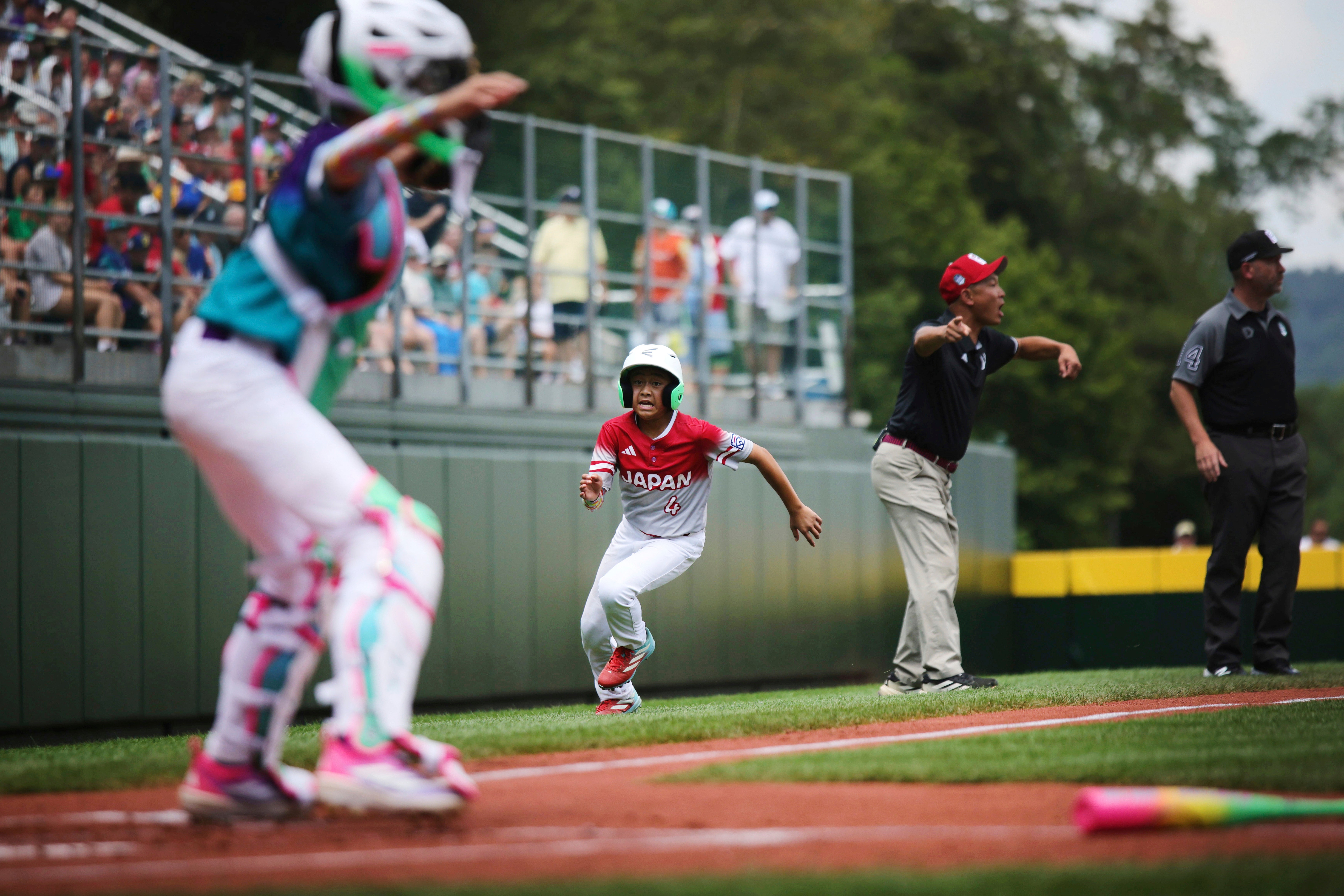 <p>Japan's Yuki Kubota rounds third base against the Czech Republic during a Little League World Series baseball game in South Williamsport, Pa., Aug. 14, 2025</p>